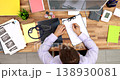 General practitioners fill paper medical records top view 138930081