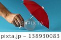 Red umbrellas and transparent glass globe 138930083