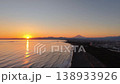 富士山とえぼし岩の間に沈む夕日のドローン映像 138933926