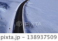 Aerial drone view of snowy mountain road in Abruzzo, Italy 138937509