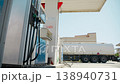 Refueling for cars at Gas Station 138940731
