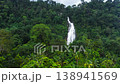 A beautiful waterfall in the mountains among the jungle. Mapalana Falls. Sri Lanka. 138941569