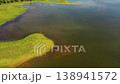 Sorabora lake among green hills against the background of mountains. Sri Lanka. 138941572
