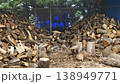 Chopped firewood and logs in a pile 138949771