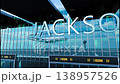 Airlane landing at Jackson, USA. Arrival in the city with reflection of airport and aircraft 138957526
