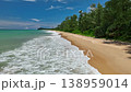 Aerial view fly backward and ascending over sea wave crashing on beach, Thailand, half time slow motion shot 138959014