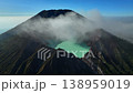 Aerial view drone orbit around to reveal Kawah Ijen volcano crater, Java, Indonesia 138959019