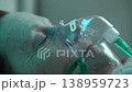Elderly woman wearing oxygen mask or CPAP in hospital or home 138959723