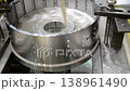 Wire-cut electrical discharge machine. Operation of wire-EDM machine cutting metal parts. Electrical discharge machine EDM cutting metal workpiece. Cutting process by wire cut machine. Metalworking 138961490