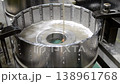 Wire-cut electrical discharge machine. Operation of wire-EDM machine cutting metal parts. Electrical discharge machine EDM cutting metal workpiece. Cutting process by wire cut machine. Metalworking 138961768