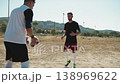Soccer Player Practicing The Volley Pass With Both Feet 138969622