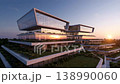 Modern Sustainable Tiered Office Building With Integrated Green Terraces At Golden Sunset 138990060