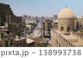 Historic Cairo Cityscape with Mosque Dome and Busy Street 138993738