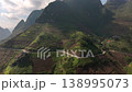 The winding road of Ma Pi Leng Pass in Vietnam. A Part of a Famous Ha Giang Loop. Beautiful destinations Asia. Aerial. 138995073