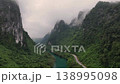 Misty Mountains of Phong Nha, Viet Nam. Aerial of a River in a Valley surrounded by Karst Mountains in South East Asia. 138995098