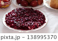 Deconstructed herring under fur coat salad beet cubes white plate Ukrainian shuba closeup 138995370