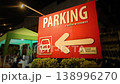 Thailand parking sign direction arrow car symbol night urban street signage 138996270