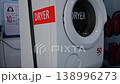 Thailand laundromat dryer machine front loading appliance public laundry service 138996273
