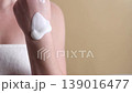 Woman squeezing cosmetic cream from tube onto hand, skincare routine and moisturizing body care concept 139016477
