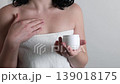 Woman applying moisturizing skincare cream on shoulder after shower, body care and beauty routine concept 139018175