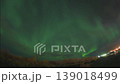 Aurora borealis in the night northern sky. Ionization of air particles in the upper atmosphere. 139018499