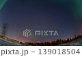 Aurora borealis in the night northern sky. Ionization of air particles in the upper atmosphere. 139018504