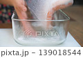 Salting salmon, Pieces of red salmon fish fillet. Red fish salinizing a piece of salmon. 139018544
