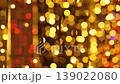 Rich Golden Bokeh Party Lights Creating Luxurious Shimmering Backdrop With Vertical Strands And Warm Glow, Ideal For Gala Staging, Wedding Planners, And Festive Commercials 139022080