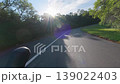 Cycling POV Road Curve Sun Rays Trees Scenic Asphalt Smooth Ride Day 139022403