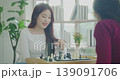 Holiday concept of 4k Resolution. Asian women playing chess together in the house. 139091706