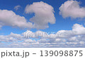Timelapse, 4K, panoramic view of a clear blue sky with cumulus clouds flying across it, daytime 139098875
