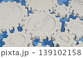 A 3D animation depicting a society where people are depicted as gears rotating. 139102158