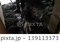 Machine floor screeding. A worker doing floor screed. 139113373