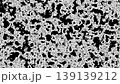 Visual patterns creating contrast in black and white colors on a textured surface 139139212