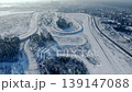 Drone video of driving cars on the autodrome track at winter day 139147088