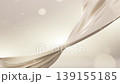 Luxurious beige-toned background with smooth flowing textures and sparkles, perfect for skincare, beauty, or premium cosmetic branding. 139155185