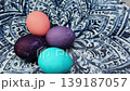 Colorful easter eggs spinning on decorated plate 139187057