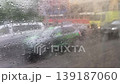 Rainy day traffic with water drops on window glass 139187060