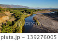 Aerial view of Nam Nam stream winding through forested mountains in Mugla, Mediterranean Turkey. 139276005