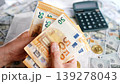 Man calculating money, monthly home expenses, taxes and bank account balance. 139278043