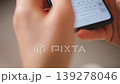 Female hands typing text on smartphone close-up. 139278046