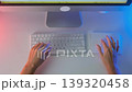 Top view of female hands working on desktop computer with keyboard and mouse, minimal clean workspace with colorful gradient lighting, office workflow, digital tasks and modern technology concept 139320458