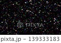 Colorful twinkling falling stars shimmering on a deep black background. Vibrant multicolored sparkles flickering across the screen, creating a magical cosmic or festive atmosphere. Seamless loop 139333183