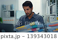 Stressed young Latin businessman having heart attack with severe chest pain at office desk. Cardiac arrest emergency, overworked burnout, medical stroke, work problem, health insurance crisis concept. 139343018