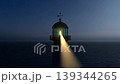 lighthouse illuminates the night view of the sea 139344265