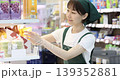 Woman stocking shelves 139352881