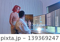 Programmers working at night analyzing code on monitors in a modern office. Software developers collaborating on debugging cybersecurity and data programming projects. Ai coding Software technician. 139369247