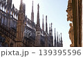 Silhouette statues on top of Duomo at sunny day close up 139395596