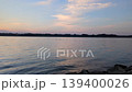 Sunset over Lake Hinuma in Ibaraki Prefecture and the calm surface of the lake. 139400026