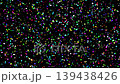 Vibrant multicolored confetti particles falling and floating on a solid black background. Bright festive dots creating a cheerful celebration atmosphere. High-quality abstract animation, seamless loop 139438426